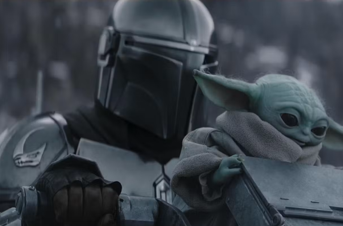 Noget fra star wars - en robot eller en soldat med en baby yoda