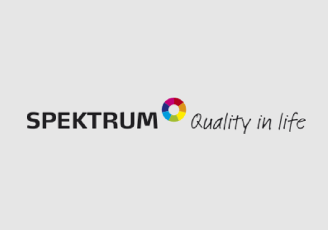 Grå baggrund sort skrift: Spektrum - et farvehjul - quality in life